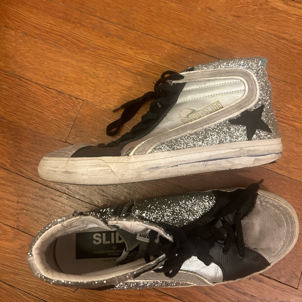 Golden Goose high top sneakers.
